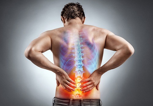 Man's back superimposed with an image of the spine