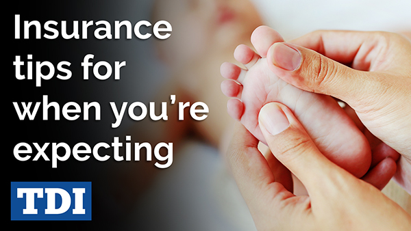 Adult hands holding a baby’s foot. The parent wondered, “What kind of insurance do I need now that I have a baby?”
