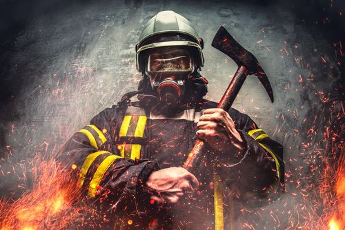 Firefighter wearing personal protective equipment